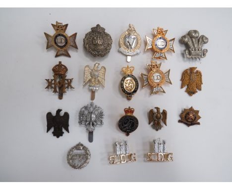 Selection of Various Cavalry Badgescap badges include chrome Queens Dragoon Guards ... KC brass 20 Hussars ... QC plated and 