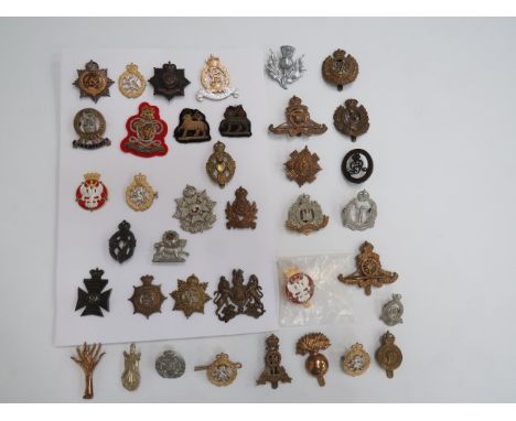 Small Selection of Various Badgesincluding QC bi-metal and enamel 15/19 Hussars ... QC bullion embroidery Queens Royal Hussar