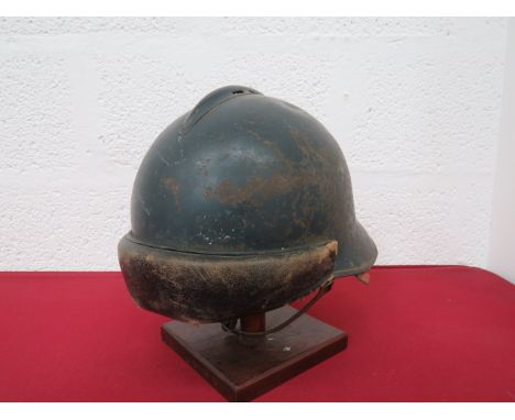 French Model 1945 Tank Crew Helmetblue painted crown and downswept rear brim.  Small top crown comb.  Front black leather pad