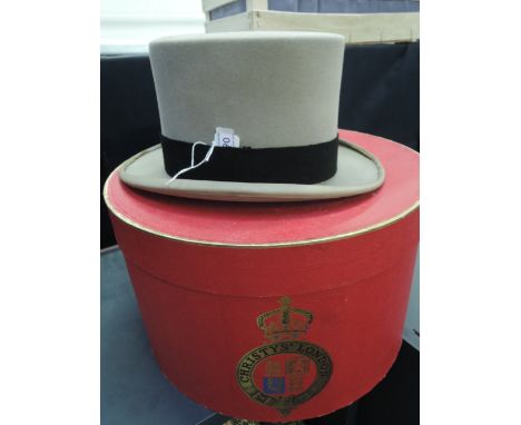 A vintage Moss Bros top hat in grey with black banding, comes in Christy's box, good condition, smaller size, approx 21' arou
