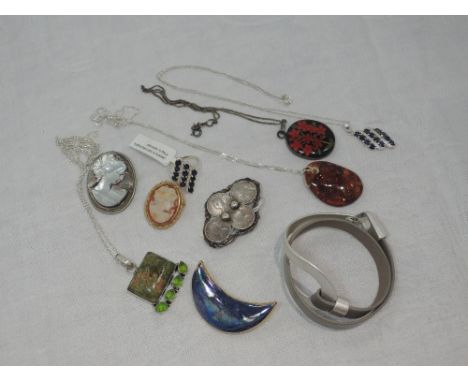 A small selection of costume jewellery including white metal pendants stamped 925, ceramic brooch, Victorian Indian coin broo