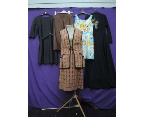 A small mixed lot of vintage ladies wear, including a 1970s maxi dress in black with embroidery to back, a brown skirt having