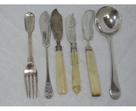 A small selection of HM silver flatware including four butter knives, a soup spoon and dessert fork, including Georgian, Vict