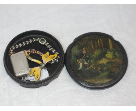 A papier mache box depicting a huntsman and dog, containing a yellow metal and silver diamante set bracelet, a white metal ve