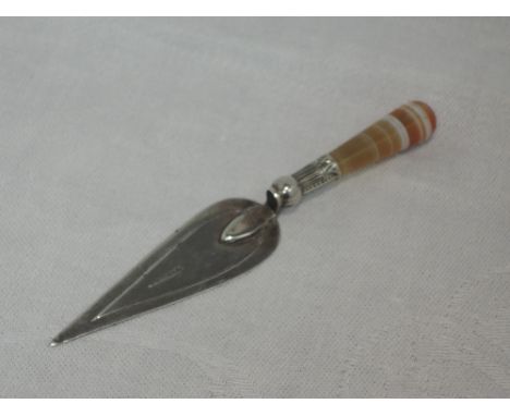 A white metal trowel bookmark stamped silver having ring agate handle