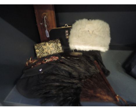 A lovely assortment of vintage items around 1930's to 50's, including glove case and stretchers, a fur handbag, three black b