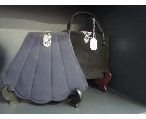 Two stunning 1930's vintage handbags, black one having integrated purse compartment and mirror, navy blue fan shaped having s