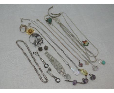 A selection of HM silver and white metal jewellery stamped silver including brooches, gate bracelet, pendants etc