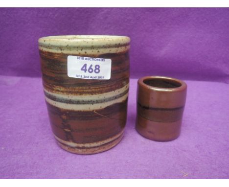 A 20th century St Ives pottery cylindrical vase by Bernard Leach of ribbed and seal mark and a smaller pot by Bernard Leach w