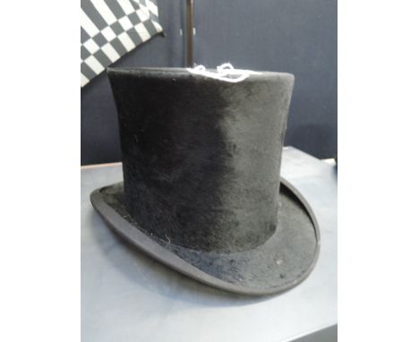 A vintage 1930's top hat, approx 21' internal band and 6' tall. Good condition, slight moth graze mainly underside
