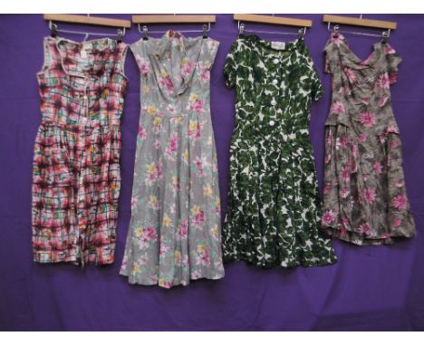 Four vintage cotton dresses in bright prints, ranging from late 40's to early 60's. Small sizes, zip broken in one, and a few