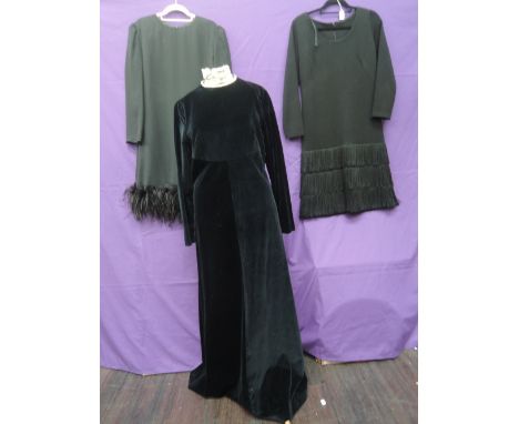 Three black vintage dresses, includes 1970s Gina Bacconi shift with feather trim to hem, 1960s wool shift with tiered tassle 