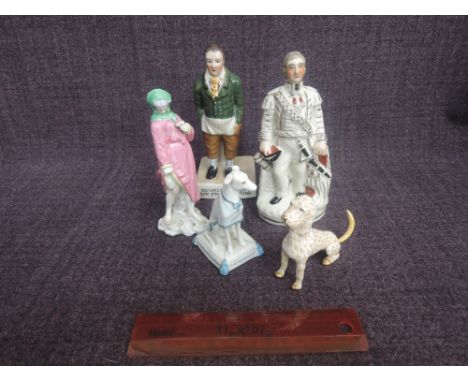 A 19th century ceramic figure modelled as a Greyhound on cushion, a late 20th century design Continental figure modelled as a