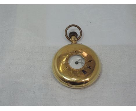 An 18ct gold half hunter pocket watch having Roman numeral dial with subsidiary seconds to a white face in plain case with ou