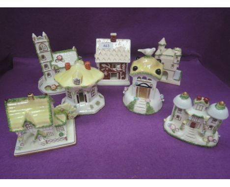 A collection of seven pastille burner style ornamental mantel cottages etc by Coalport