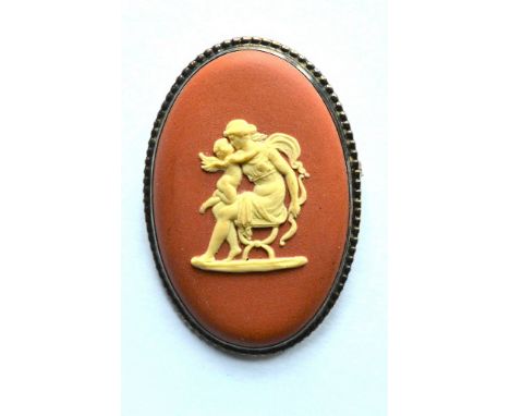 A rare mid 20thC Wedgewood terracotta Jasperware neo-classical cameo brooch.  Set in silver and depicting Eros and Venus. Len