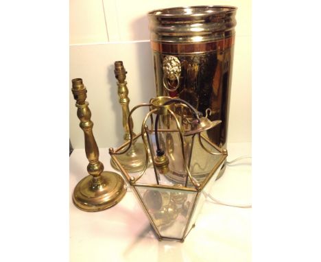 Ornate stick umbrella stand, with lion head handles, a glass lantern light fitting & a pair of brass lamp bases.