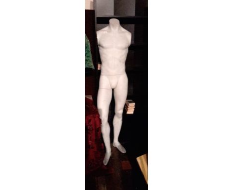 A pale grey male mannequin
