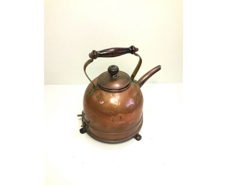 An early copper electrical kettle.