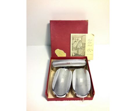 Set of 3 boxed Linek clothes brushes, with engine turned decoration. 