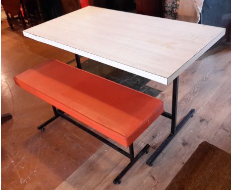 A Mid 20thC metal framed table with bench.