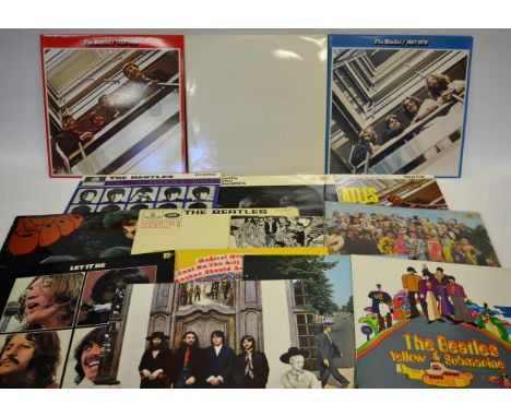 The Beatles Long Playing Records 2xPlease Please Me, 2xWith the Beatles, 3xA Hard Days Night (one lacks sleeve), Help, Rubber