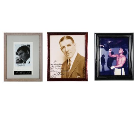 Boxing: [Muhammad Ali]&nbsp;An original coloured Photograph of Ali in training&nbsp;signed at center (Faded), framed; togethe