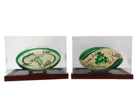 Rugby: I.R.F.U, [Grand Slam Team 2009] Two cased Rugby Replica Balls, each&nbsp;Signed by various members of Irish Rugby Inte