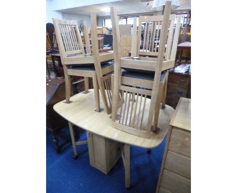 A MODERN LIGHT OAK DROP-LEAF DINING TABLE, approximate extended size length 132cm x width 92cm x height 76cm and four chairs 