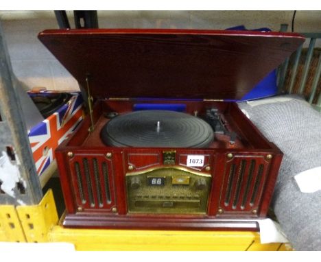A MODERN RECORD PLAYER, with CD player (Thomas Pacconi label attached)