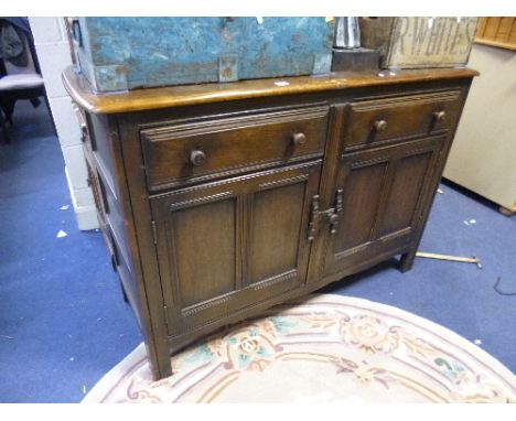 A DARK ERCOL SIDEBOARD, with two drawers