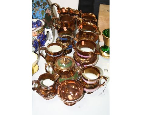 A GROUP OF LUSTRE WARES, jugs, a teapot etc (11)