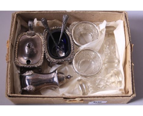 A SILVER PLATED THREE PIECE CRUET, together with two silver rimmed cut glass open salts (one a/f) and two cut glass knife res