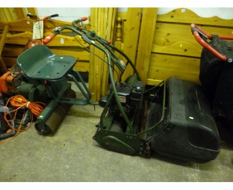 A WEBB PETROL 24' CUT CYLINDER LAWN MOWER, with seated roller and grassbox