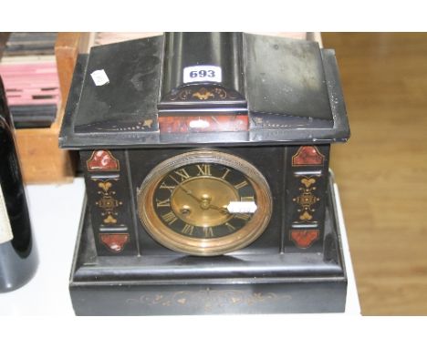 A SLATE MANTLE CLOCK, with pendulum