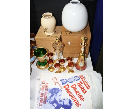 A GLASS DECANTER AND GLASSES, gilt decoration, two boxed modern oriental vases, a desk blotter and posters