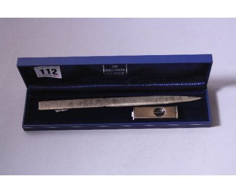A CASED SILVER PAPER KNIFE, 925, approximately 20cm long, 1.8ozt, together with an engine turned cigar cutter (2)