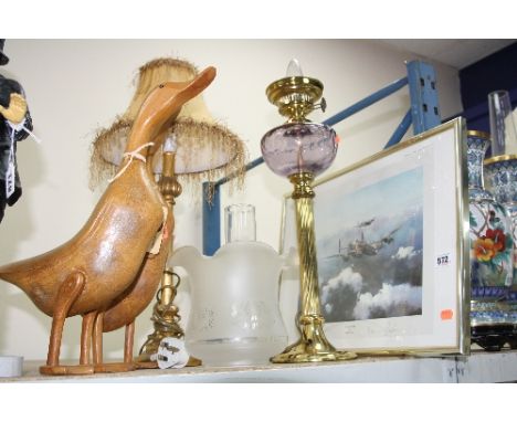A BRASS OIL LAMP CONVERTED TO ELECTRIC, another lamp, a print 'Lancaster' by Robert Taylor and pair of novelty wooden ducks (