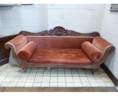 A VICTORIAN WALNUT SCROLLED ARM SOFA, on raised turned legs