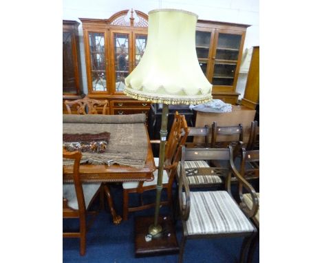 A BRASS STANDARD LAMP AND SHADE, with heavy mahogany base 