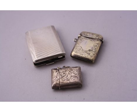 TWO SILVER VESTAS, with one white metal case, hallmarks for Birmingham and Chester (3)