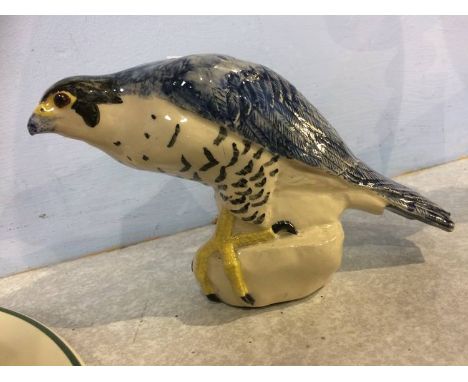 A ceramic bird of prey