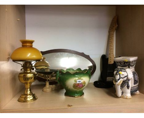Mirror, scales, oil lamp etc.