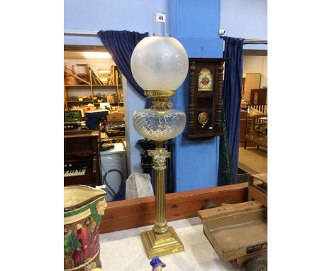 An oil lamp on Corinthian column