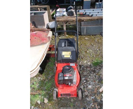 A Champion lawn mower - engine turns.