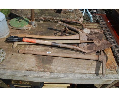An axe, shovel and fork heads, etc.