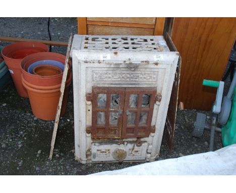 A French style enamel multi fuel stove.