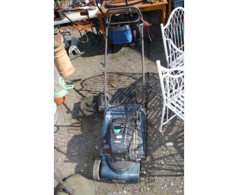 A Hayter roller mower for spares and repairs.