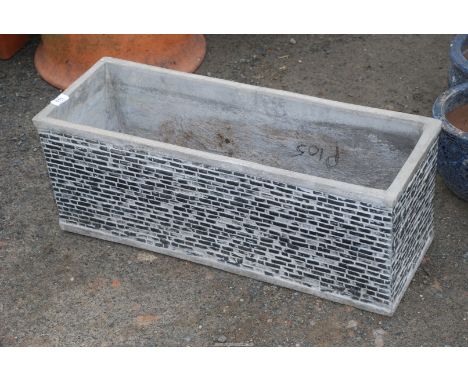 A concrete planter.
