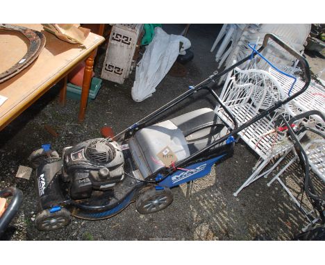 A Macallister petrol lawn mower - engine turns.